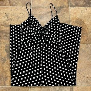 Adorable black and white polka dot jump suit.